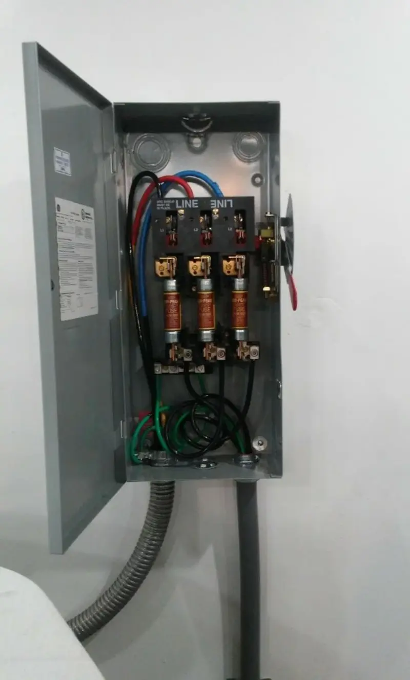 Three-phase disconnect switch installed for Smoke Detector Installation in Lake of the Woods